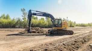 Nuovo sistema automatico per escavatore Topcon con comandi a sfioramento